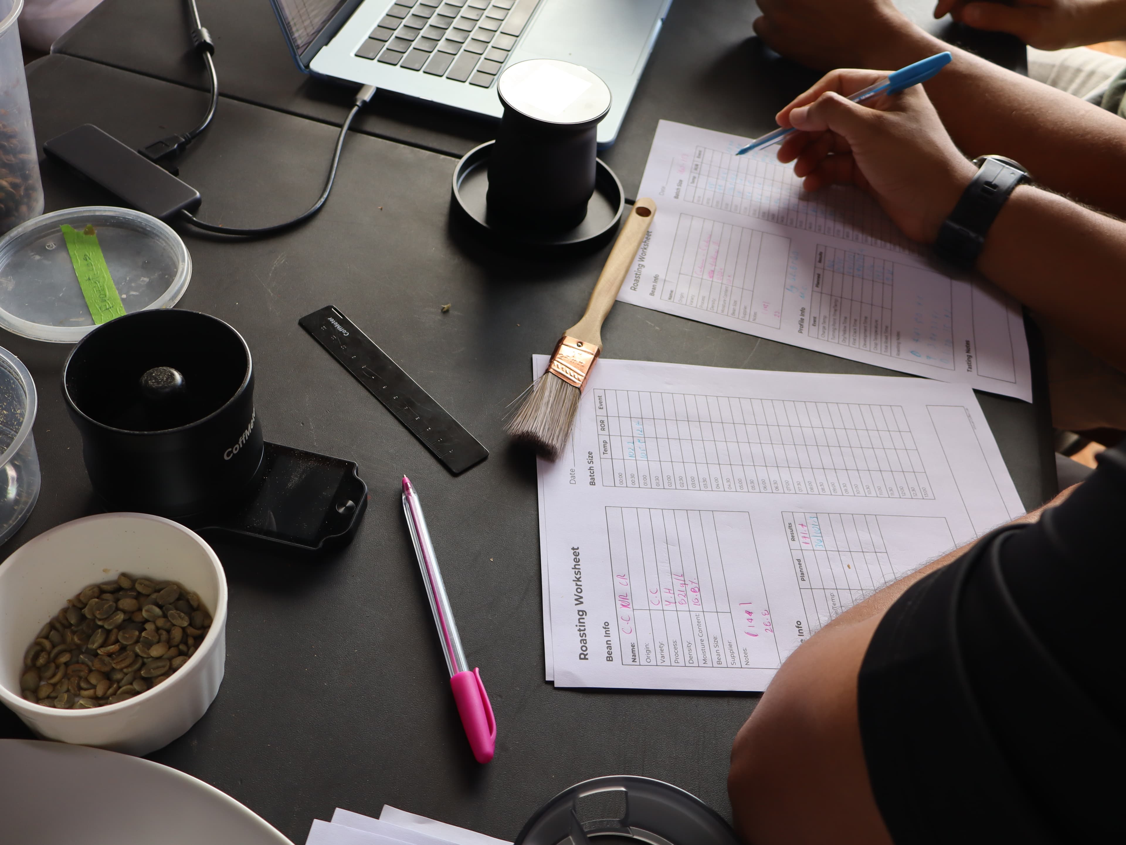 Cupping — every lot scored on SCA protocol before it is offered